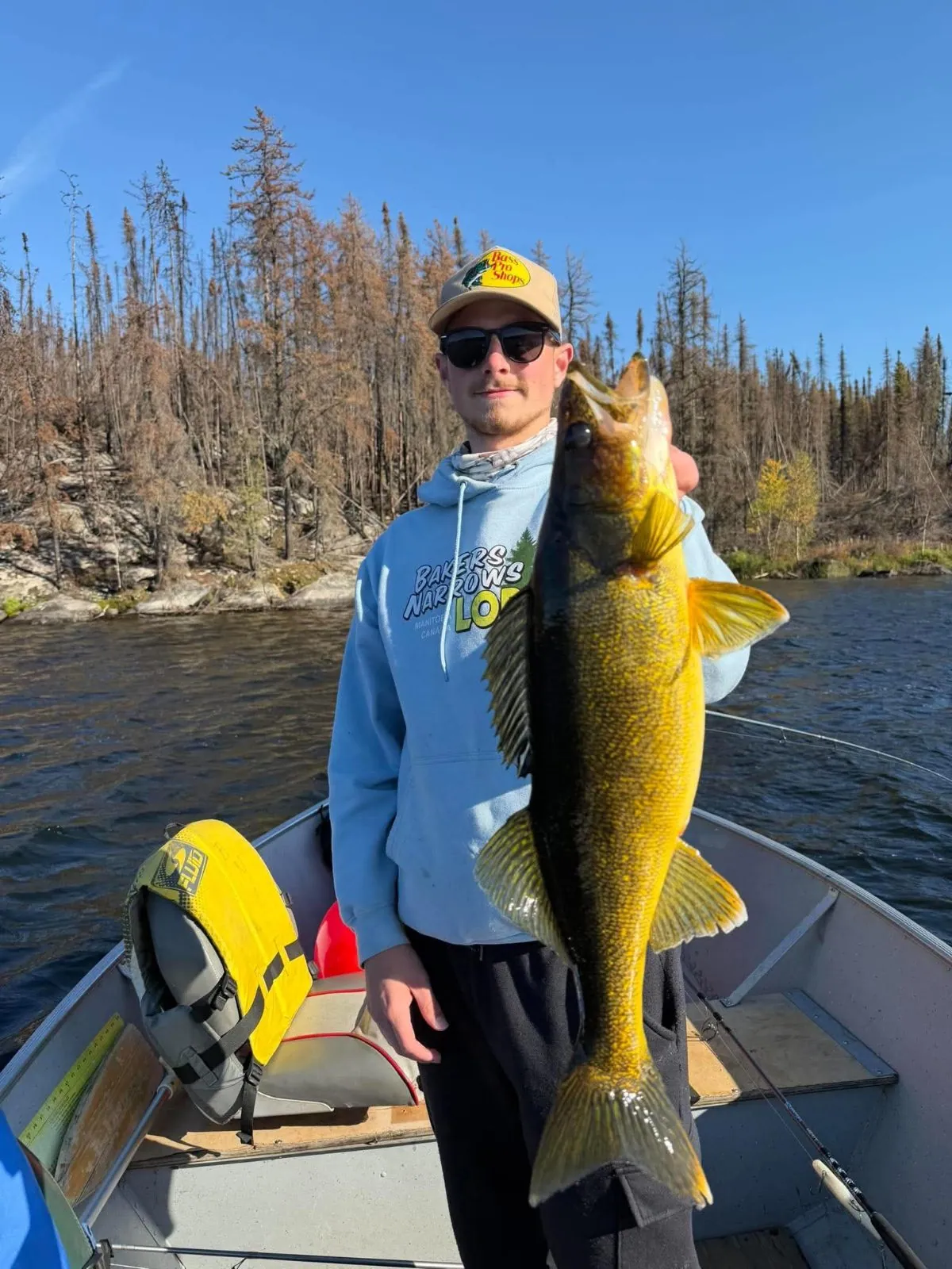 Big walleye caught at Kamuchawie Lake, held up in a boat at the Bakers Narrows fly-in outpost
